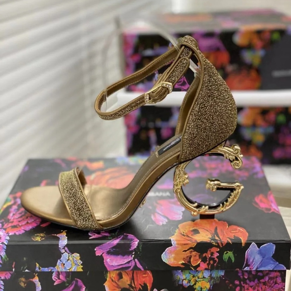 High heel shoes, gold color, size 42. New in box.